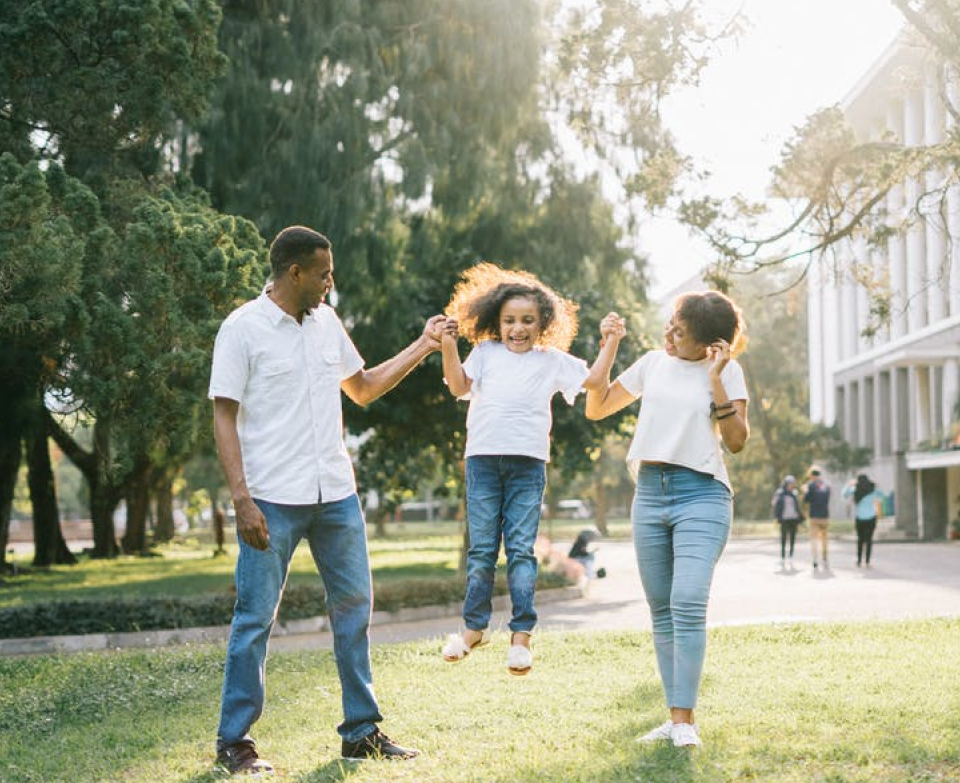 man and women enjoying with children